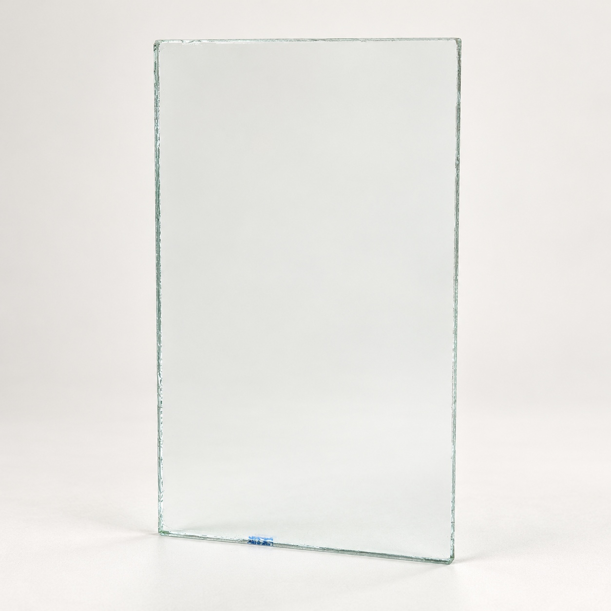 Clear glass sample held for identification